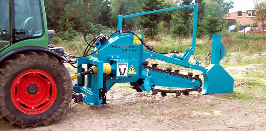 Trencher for laying underground cables